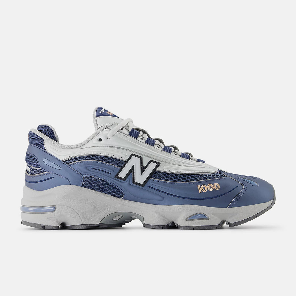 NEW BALANCE 1000P - Vintage Indigo con Light Silver Metallic y Peach Nectar