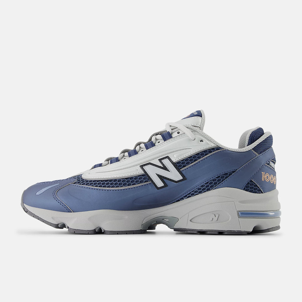 NEW BALANCE 1000P - Vintage Indigo con Light Silver Metallic y Peach Nectar